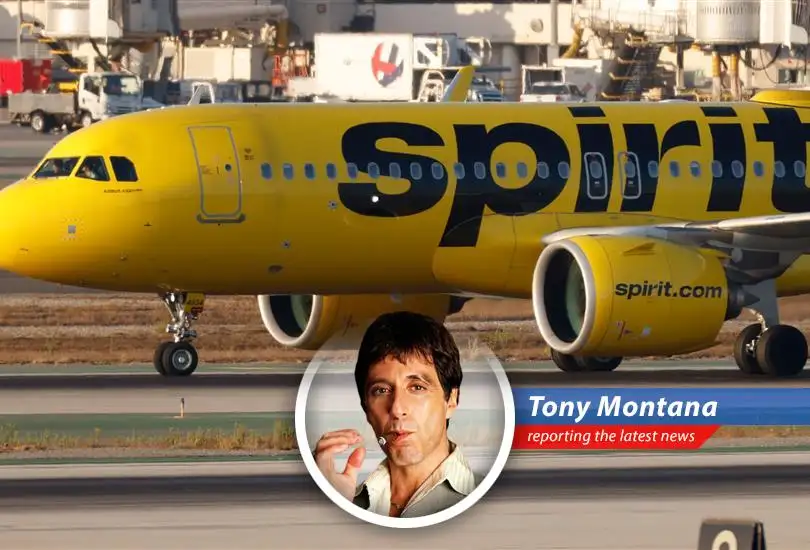 A Spirit Airlines plane on the tarmac, symbolizing the airline's struggle and its new strategy to stay afloat.