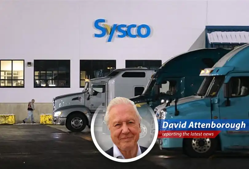 A Sysco truck delivers supplies to a restaurant, illustrating the company's vast distribution network.