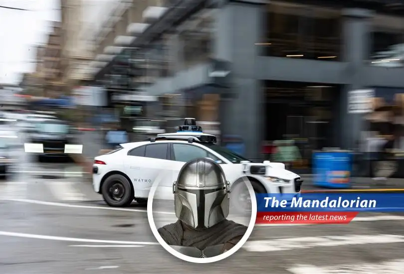 A Waymo robotaxi navigating city streets highlighting the debate between technological advancement and public safety concerns.