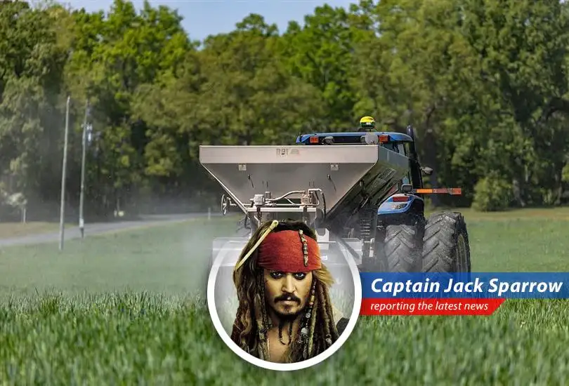 A farmer contemplates the rising costs of fertilizer, a challenge impacting farms across the nation.