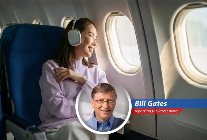 A passenger enjoying the comfort of a first-class airline seat, illustrating the potential for upgrading with credit card benefits and points.