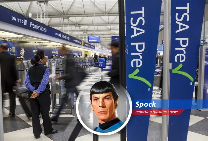 Airport security lines at a major hub. The averted suspension of PreCheck offers a temporary respite for travelers.