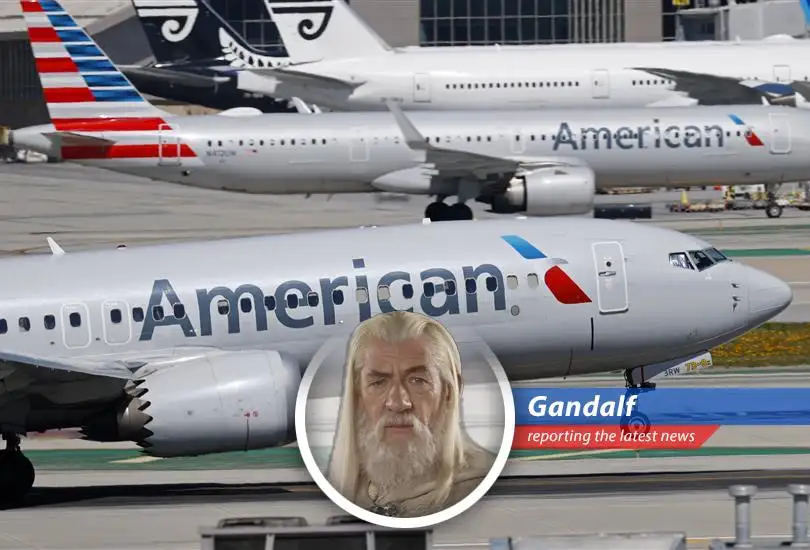 American Airlines aircraft at a busy airport terminal, symbolizing the complexities of airline mergers.