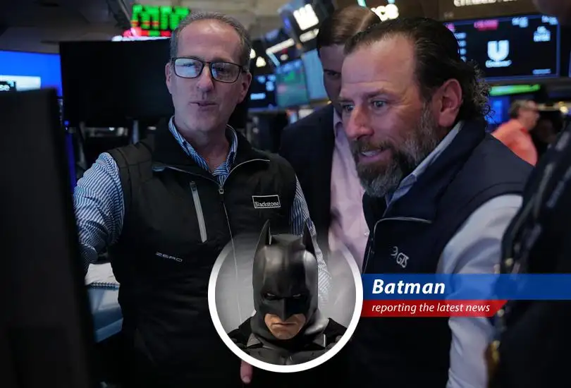 Batman overlooking Gotham's financial district, ensuring fair play and market stability.