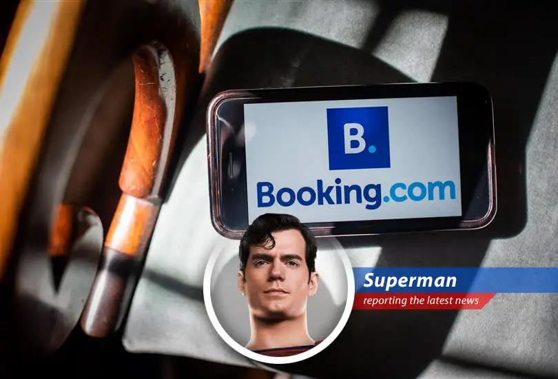 Booking Holdings logo displayed on a digital screen, symbolizing its central role in the online travel industry.