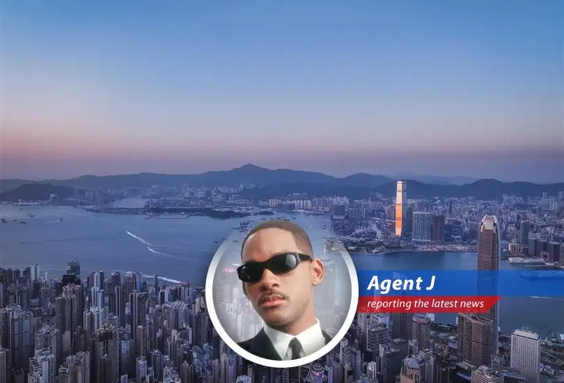 Container ships at Hong Kong port highlighting the city's efforts to boost maritime activities through tax incentives for commodity traders.