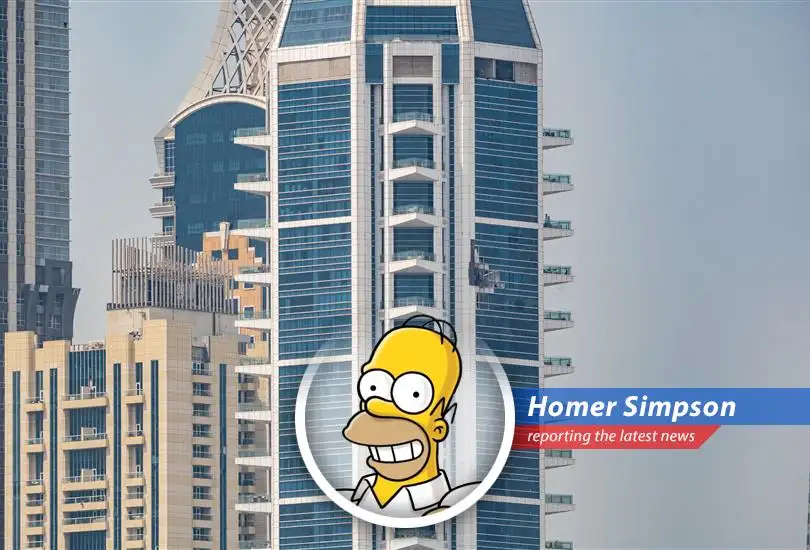 Debris from an aerial interception falls onto a vehicle in the Al Barsha area, resulting in damage.