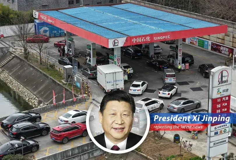 Lines form at Chinese gas stations as residents anticipate a price hike announcement from Sinopec.