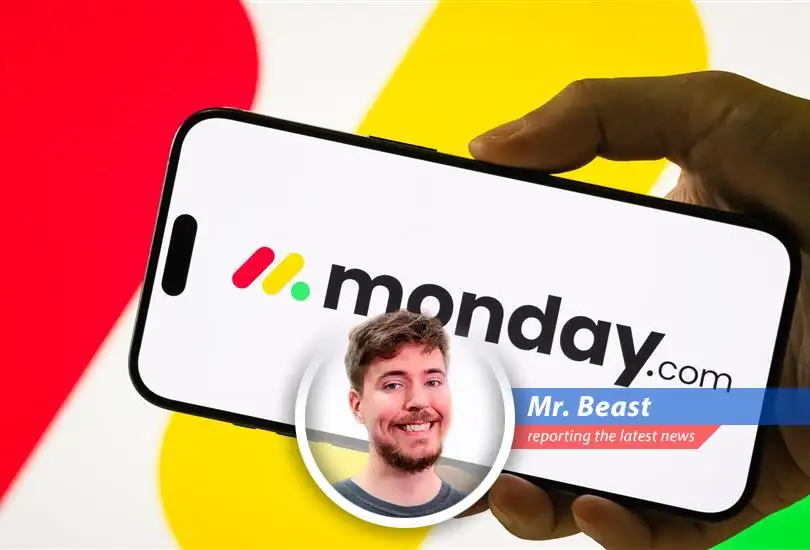 Monday.com logo displayed against a backdrop of plummeting stock values reflecting market concerns over AI disruption in the software industry.