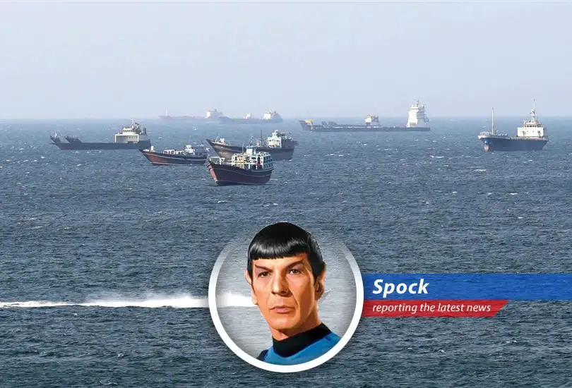 Oil tankers navigate the Strait of Hormuz, a critical chokepoint for global energy supplies amidst geopolitical tensions.