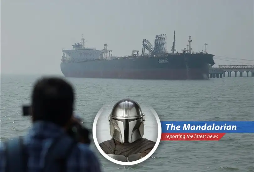 Oil tankers navigate the Strait of Hormuz, a critical chokepoint threatened by ongoing conflict.