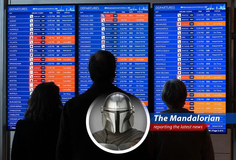 Snow blankets a grounded aircraft amidst widespread flight cancellations due to a severe winter storm.