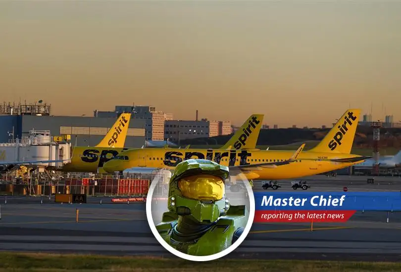 Spirit Airlines plane on a tarmac, symbolizing the airline's potential liquidation and financial struggles.