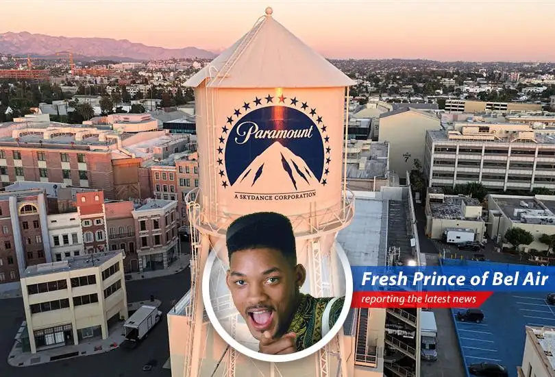 Warner Bros. Discovery logo over a blurred cityscape hinting at the corporate drama unfolding behind closed doors