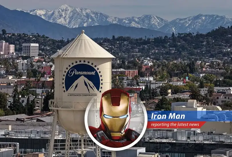 Warner Bros. Discovery's headquarters amidst merger speculation. Tony Stark analyzes the business strategy from a technological perspective.