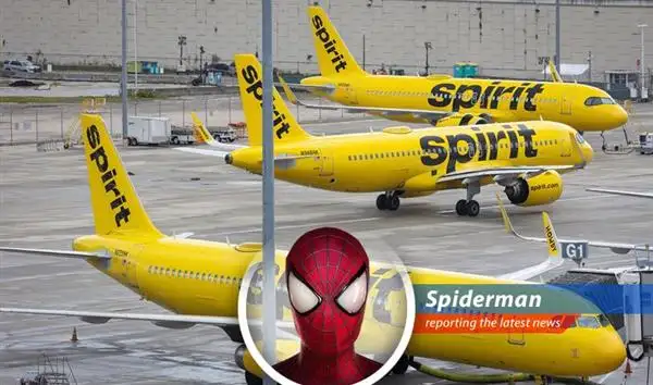 A Spirit Airlines plane sits on the tarmac, possibly signaling the end of an era for budget air travel.
