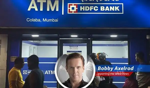 HDFC Bank logo displayed amidst news of chairman's resignation and subsequent stock drop.
