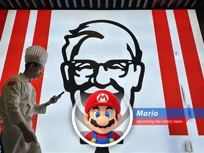 A BYD electric vehicle charges at a KFC drive-thru in China, blending fast food convenience with EV charging solutions.