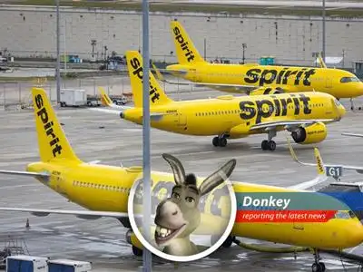A Spirit Airlines plane on the tarmac symbolizing the airline's potential grounding due to financial struggles.