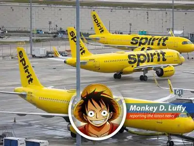 A Spirit Airlines plane on the tarmac, symbolizing the airline's uncertain future