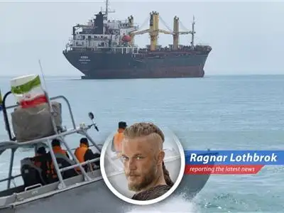 A US Navy ship navigating the Strait of Hormuz amidst rising tensions between the US and Iran.