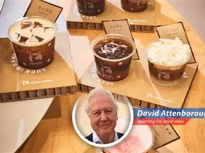 A customer enjoys a premium coffee beverage at Luckin Coffee's new Origin Flagship store in Shenzhen, China, marking a departure from the company's traditional budget-friendly model.
