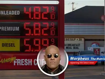 A gas pump displays rising prices amid discussions of a federal gas tax holiday.