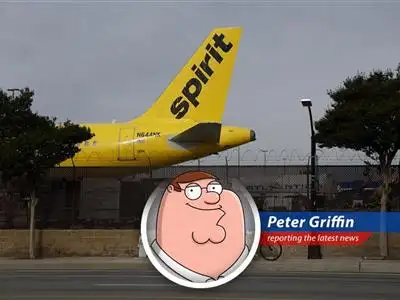 A grounded Spirit Airlines plane symbolizes the carrier's financial troubles and ultimate demise.