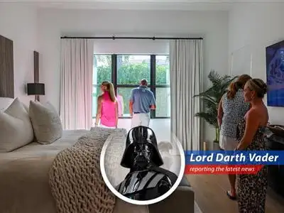 A lone house stands amidst economic turmoil, symbolizing the resilience and uncertainty of the current spring housing market.