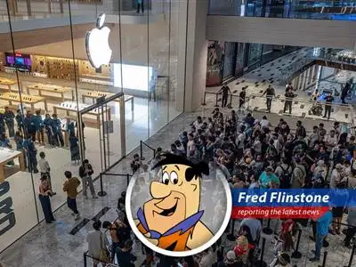 A modern stone age family gazes worriedly at their smartphone-shaped rocks, pondering the future of technology in Bedrock.