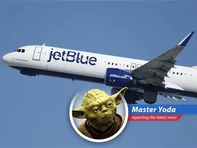 A passenger checks in luggage at an airport, facing potentially higher fees as airlines adjust to rising fuel costs. 