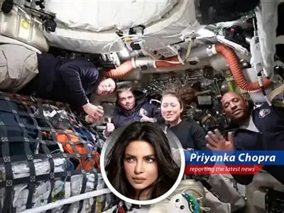 Artemis II astronauts celebrate surpassing Apollo 13's distance record during their historic lunar flyby.