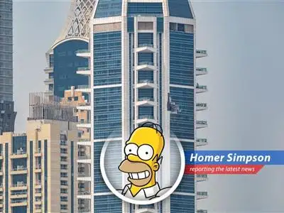 Debris from an aerial interception falls onto a vehicle in the Al Barsha area, resulting in damage.