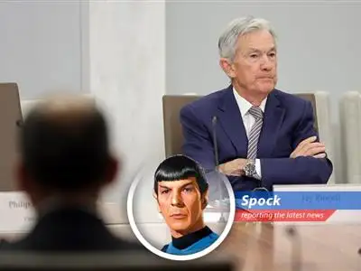 Federal Reserve Chairman Jerome Powell addresses the press, affirming his commitment to serve out his term.