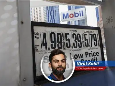 Gas prices displayed at a fuel pump station.