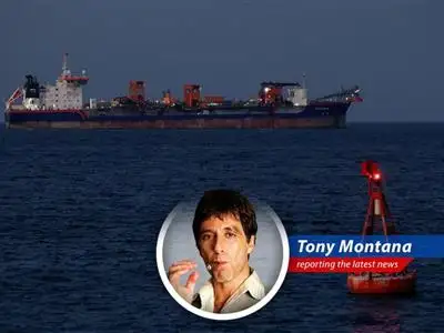 Iranian oil tanker navigating the Strait of Hormuz, a critical artery for global energy supplies.