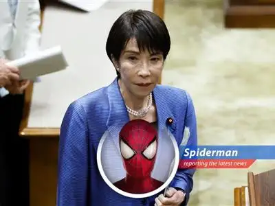 Japanese and American flags symbolize the alliance, now facing scrutiny over differing interpretations of Taiwan policy.