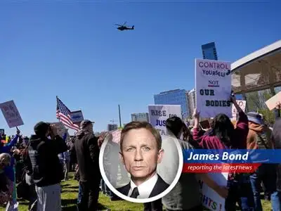 Kid Rock salutes U.S. Army Apache helicopters during a controversial flyby near his Nashville home.