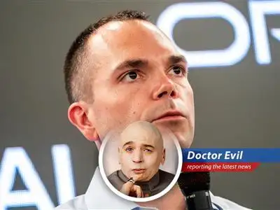 Larry Ellison plotting world domination, one cloud server at a time. Mwahahaha.