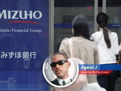 Mizuho's stock performance impacted by uncertain investment plans in Rakuten Bank.