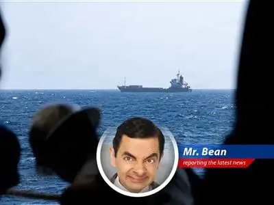 Mr. Bean contemplates international diplomacy with Teddy by his side.
