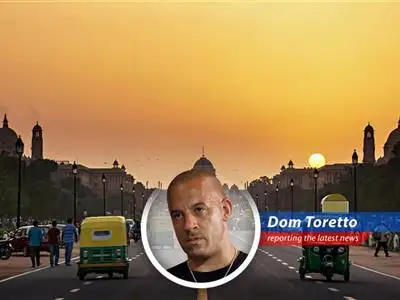 Oil tankers at a refinery symbolize India's reliance on oil imports amid rising global tensions.