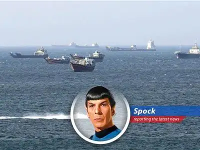 Oil tankers navigate the Strait of Hormuz, a critical chokepoint for global energy supplies amidst geopolitical tensions.