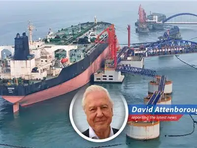 Oil tankers navigating the Strait of Hormuz, a critical chokepoint for global oil supplies.