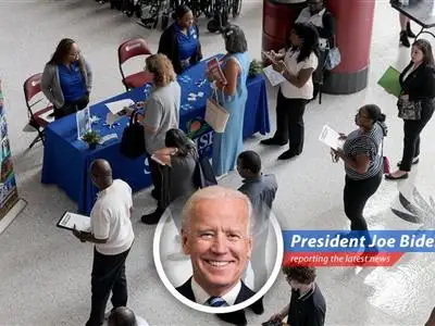 President Biden reviews the latest jobs report with economic advisors, focusing on maintaining stability and growth.