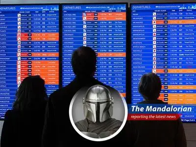 Snow blankets a grounded aircraft amidst widespread flight cancellations due to a severe winter storm.