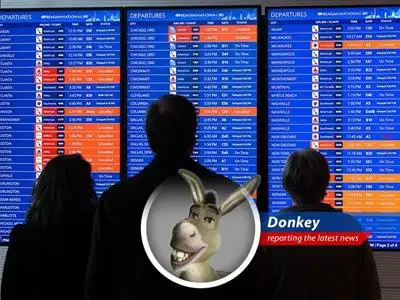 Snow-covered plane during a winter storm, symbolizing airline flexibility with fee waivers.