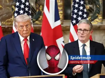 Spiderman contemplates the UK's decision on the city skyline.