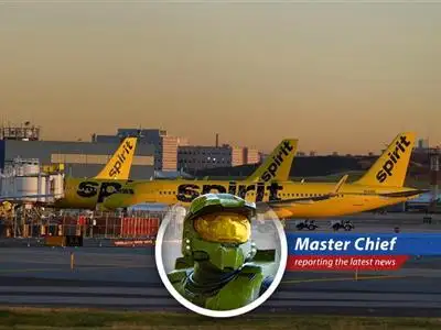 Spirit Airlines plane on a tarmac, symbolizing the airline's potential liquidation and financial struggles.