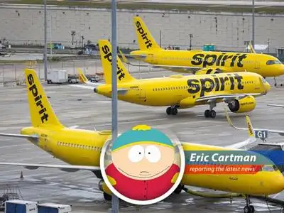Spirit Airlines plane parked at an airport, symbolizing the airline's potential shutdown after failed bailout negotiations.